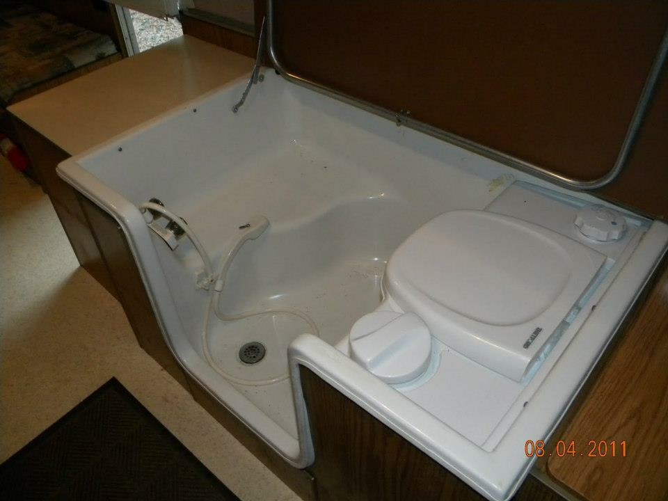 Original wet bath inside the Jayco Eagle popup with Thetford cassette toilet and shower