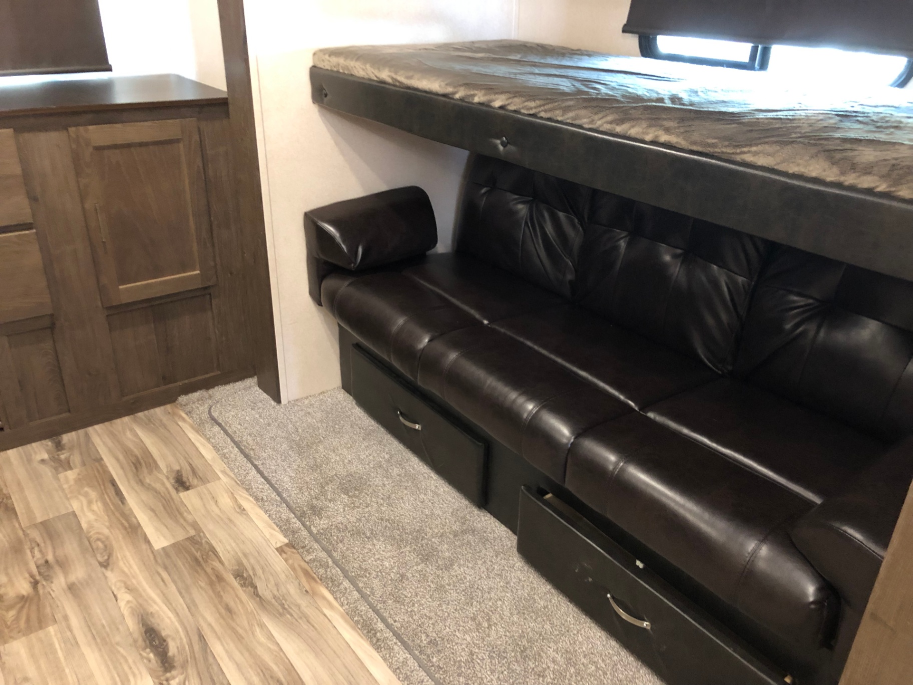 Second view of the Heritage Glen LTZ 312QBUD bunk room sofa, upper bunk, and lower storage drawers