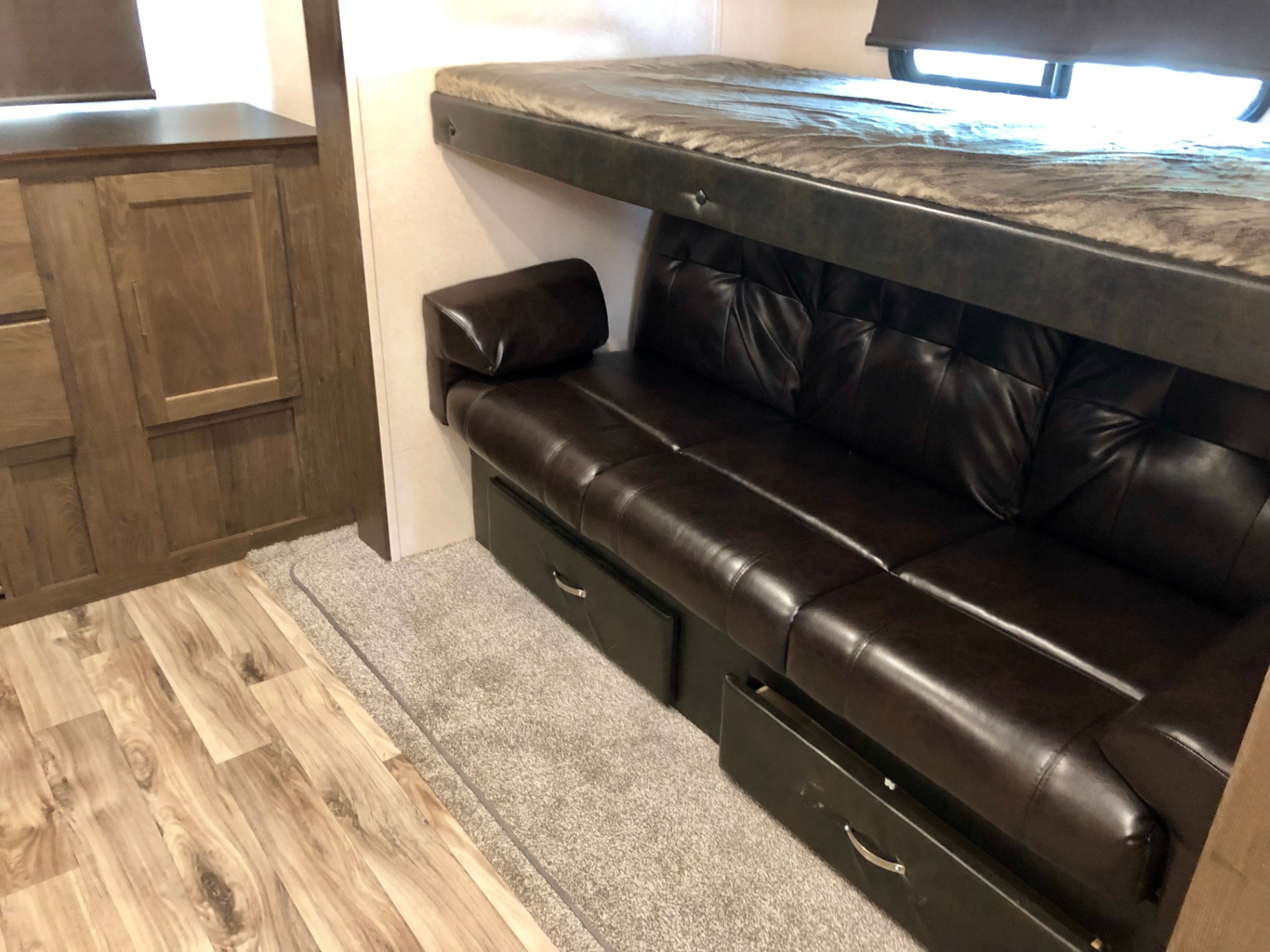 2018 Heritage Glen LTZ 312QBUD rear bunkhouse with jackknife sofa, upper bunk, and storage drawers