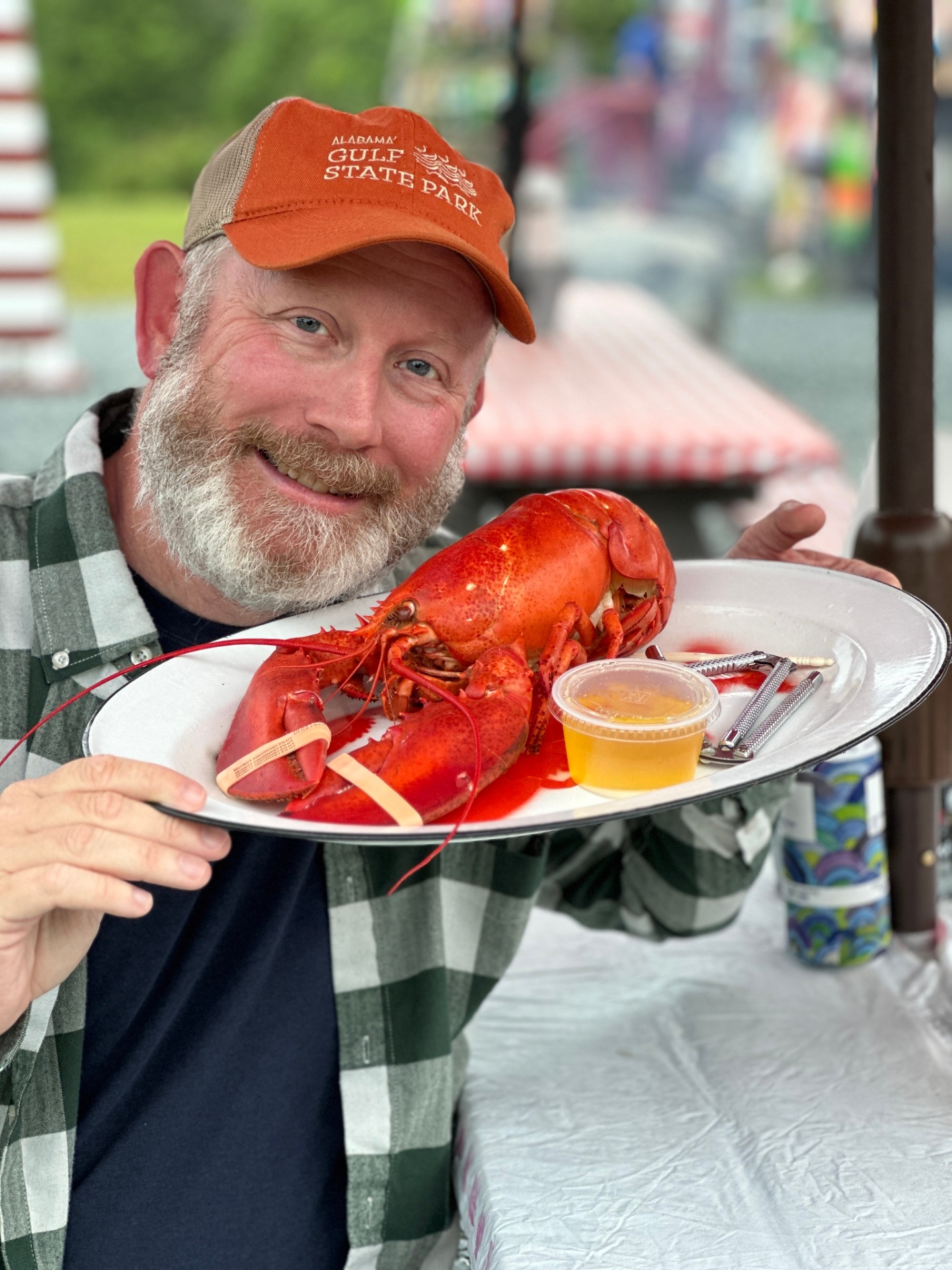 Chad holding up a lobster dinner in Bar Harbor