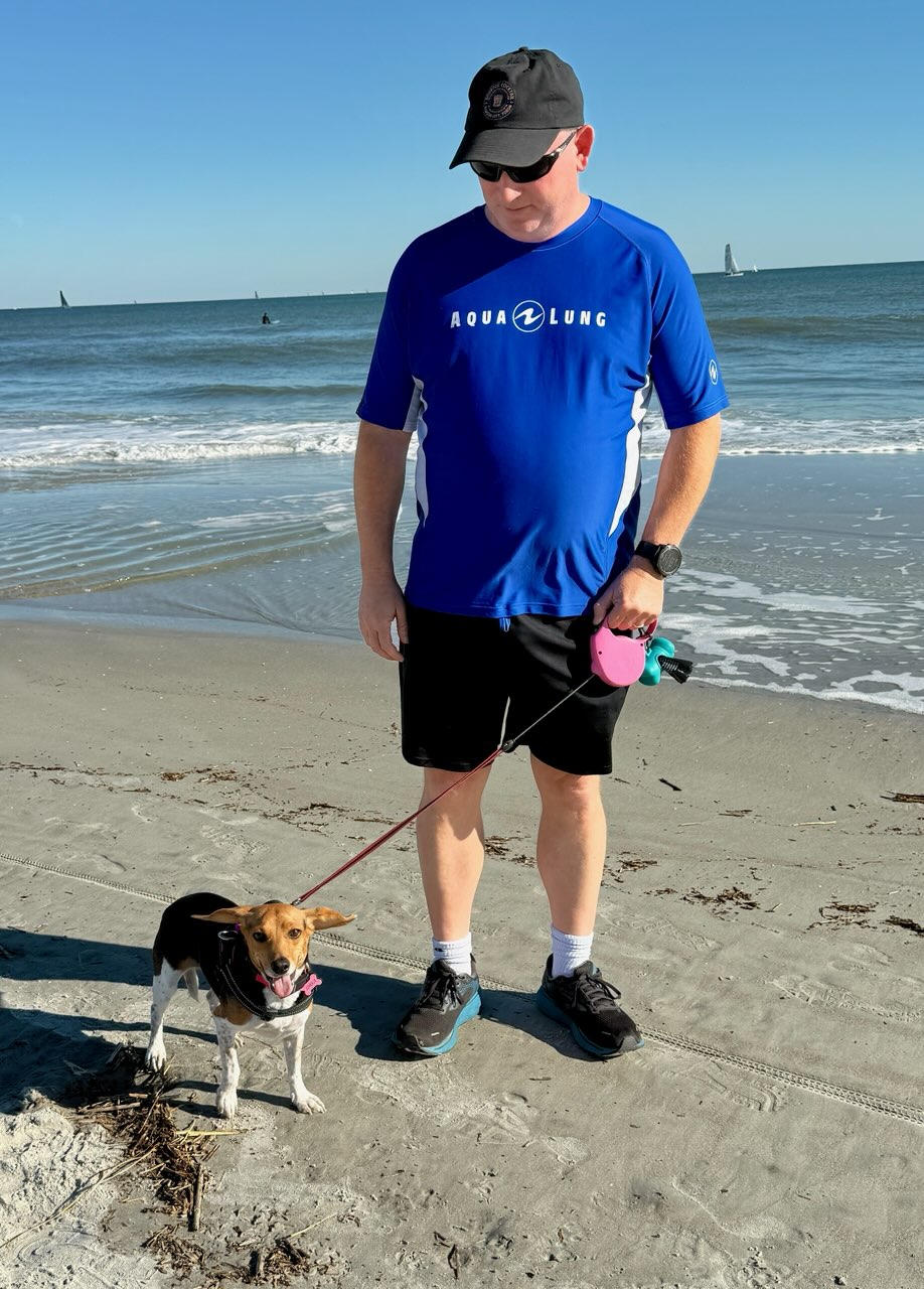 Chad walking Juneaux along Coligny Beach on Hilton Head Island