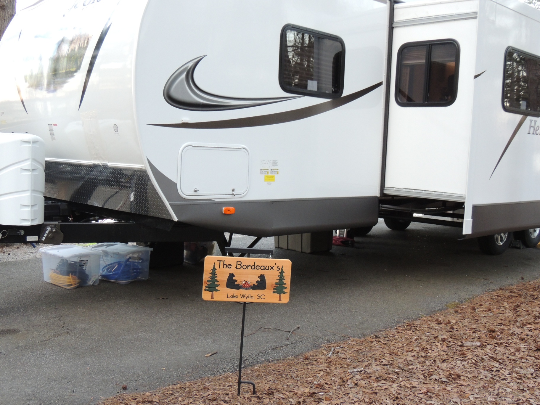 The Roadsheaux family campsite sign staked in front of the Heritage Glen travel trailer