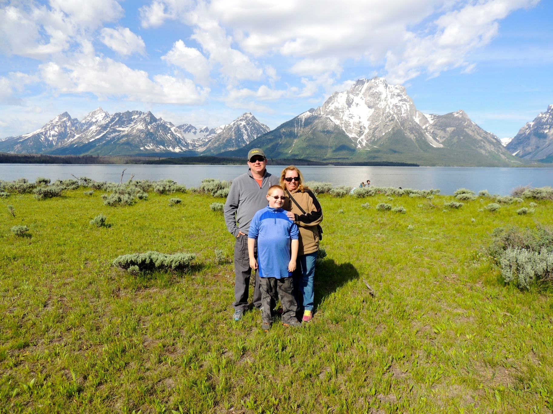 The Roadsheaux family in front of Jackson Lake at Grand Teton National Park in 2014
